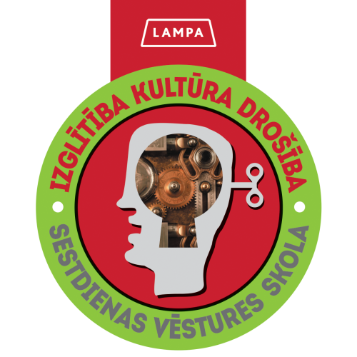 apaļa zaļa medaļa
ar sarkanu LAMPAS ordeņlentīti
centrā galva, kurā atsegti domu zobrati